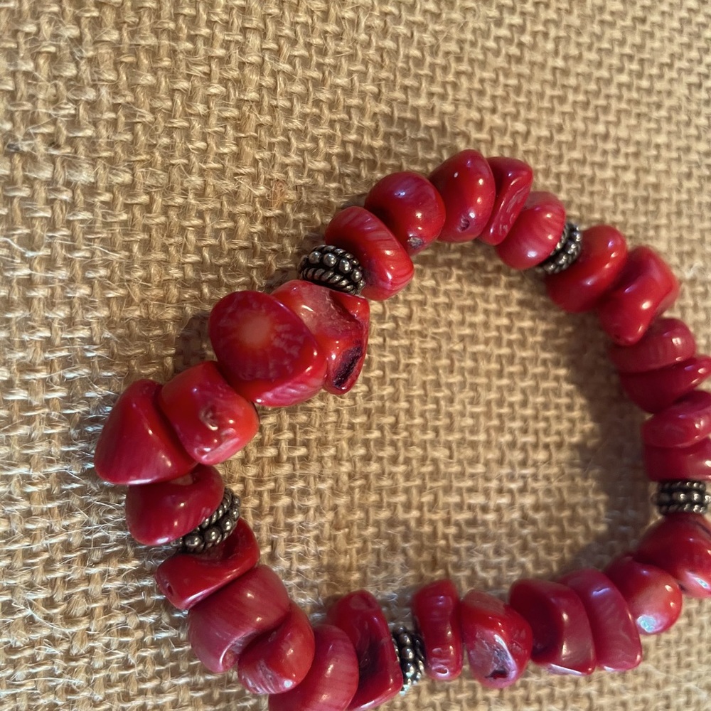 Red bracelet.